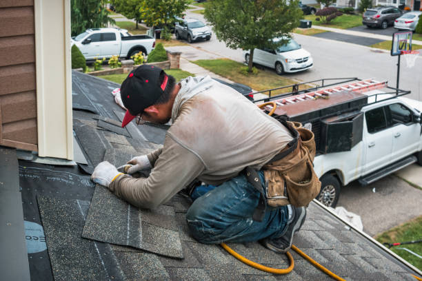 Professional Roofing technician working in Camas, WA